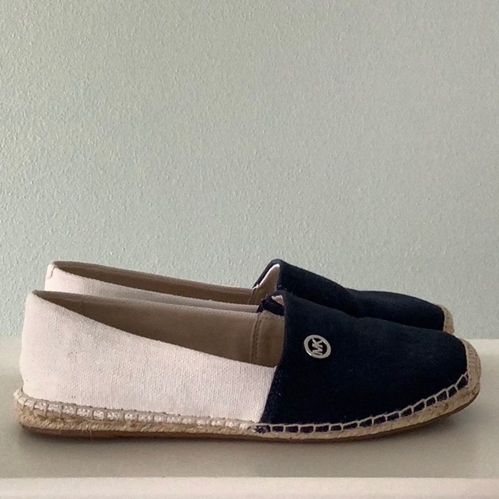 Michael Kors navy and white espadrilles.
